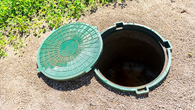 septic tank riser installation